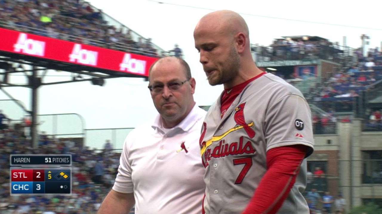 Holliday hit in head by pitch