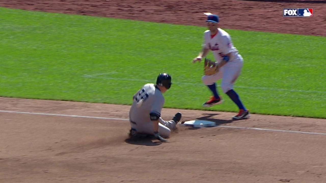 Ackley legs out a triple
