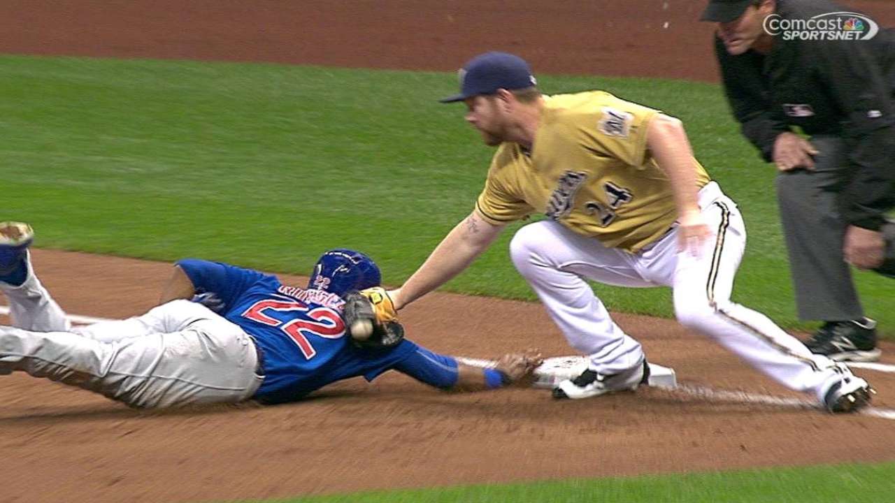 Russell safe at first