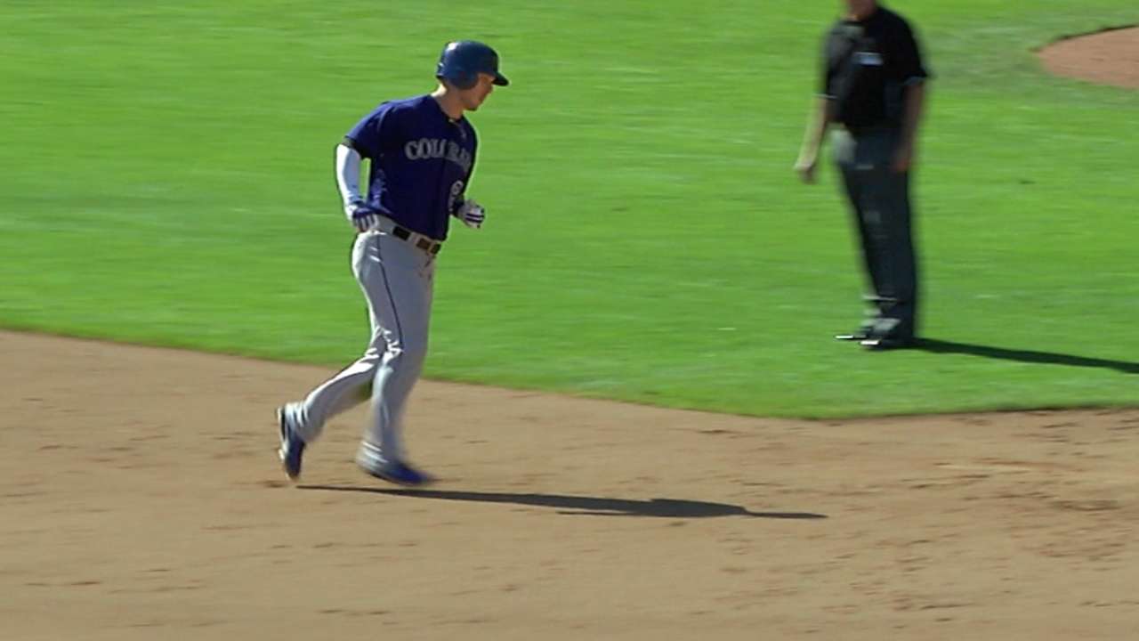 Rockies rally big in ninth to beat Giants in finale