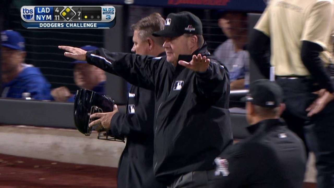 Safe at second stands on sac fly