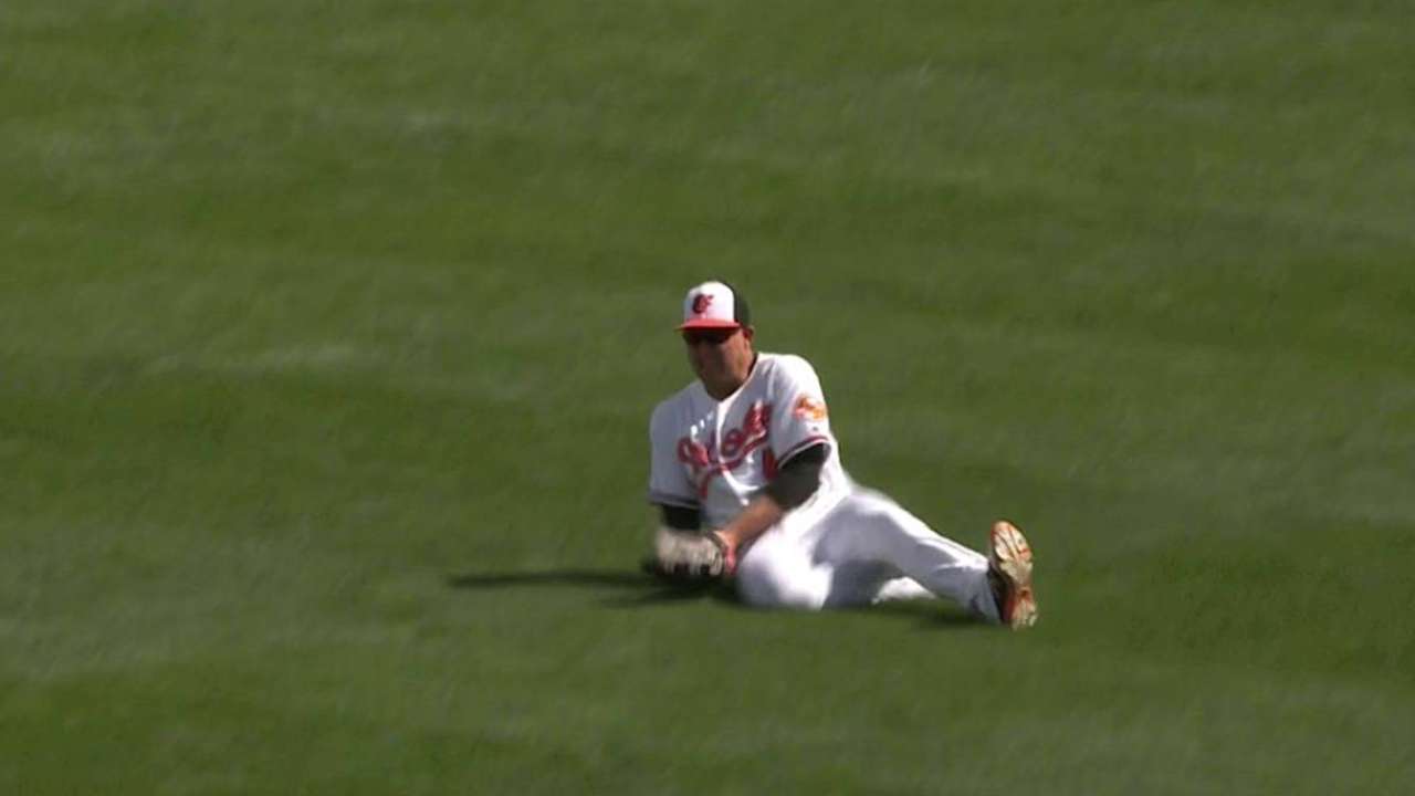 Trumbo increasing defensive work in outfield