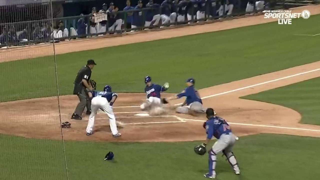 Utley scores on wild pitch