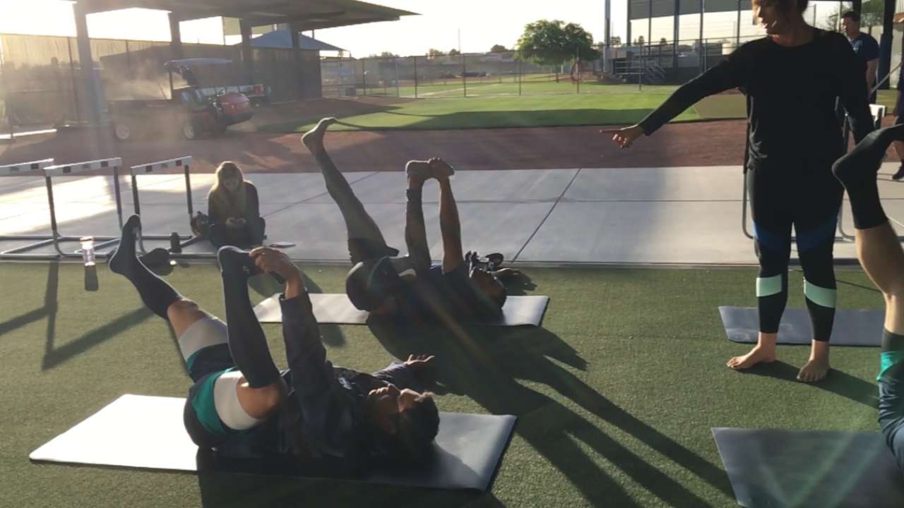 Mariners learning yoga at camp