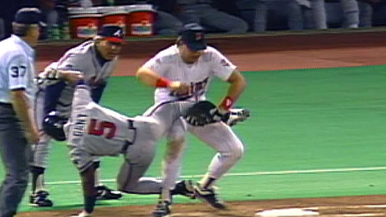 Hrbek lifts Gant off bag