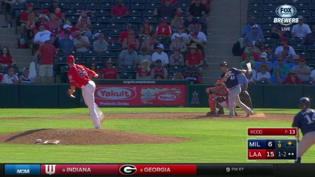 Brewers purchase Elmore, designate Presley