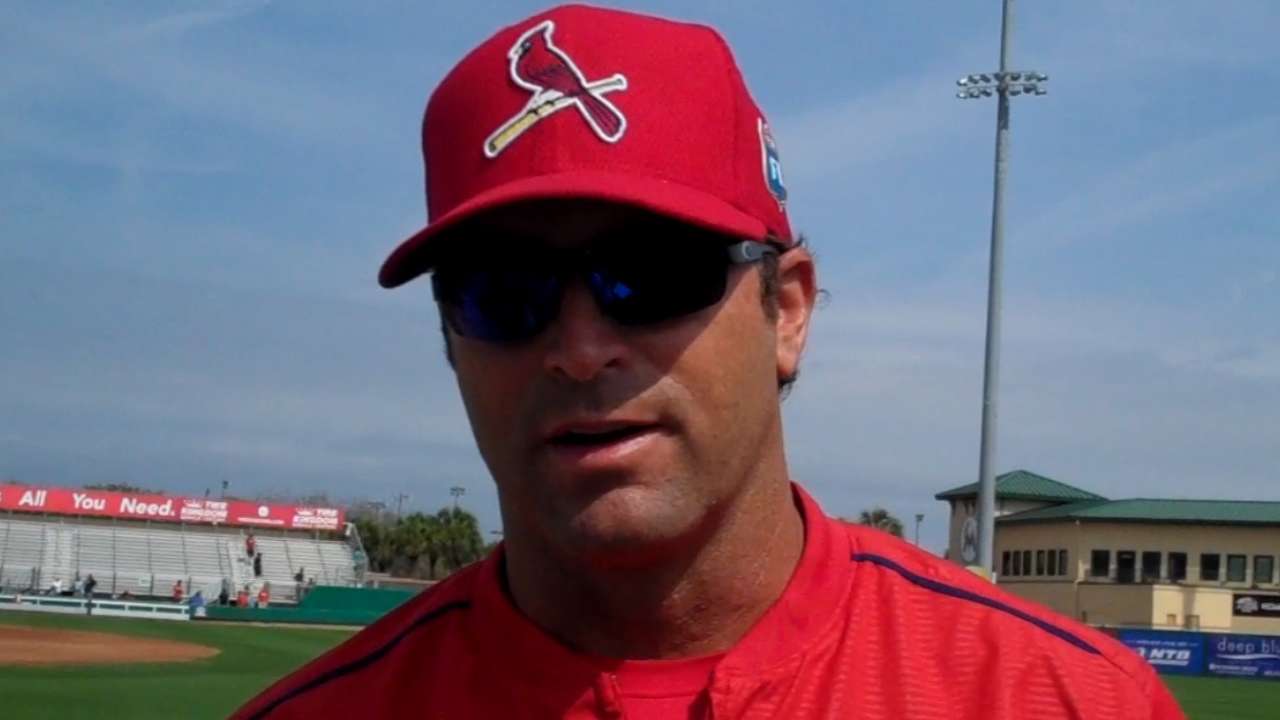 Cardinals reduce camp roster by nine