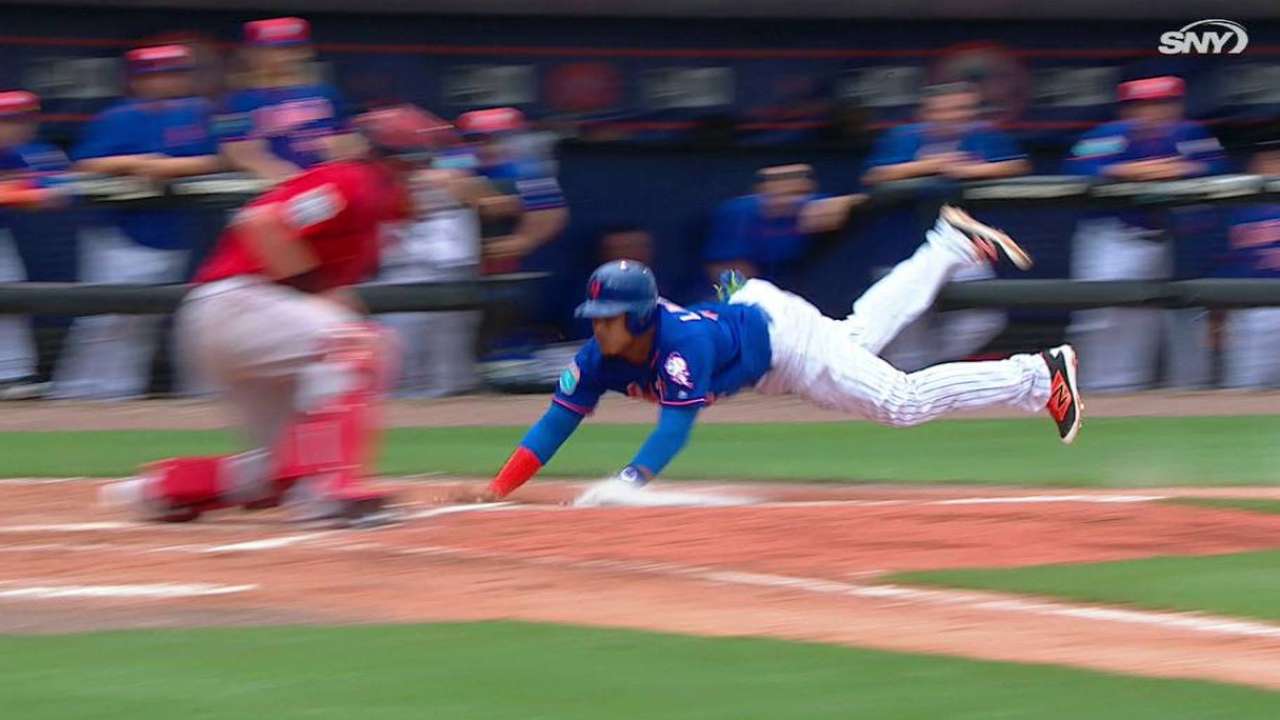 Stealing a moment: Lagares swipes home vs. Sox