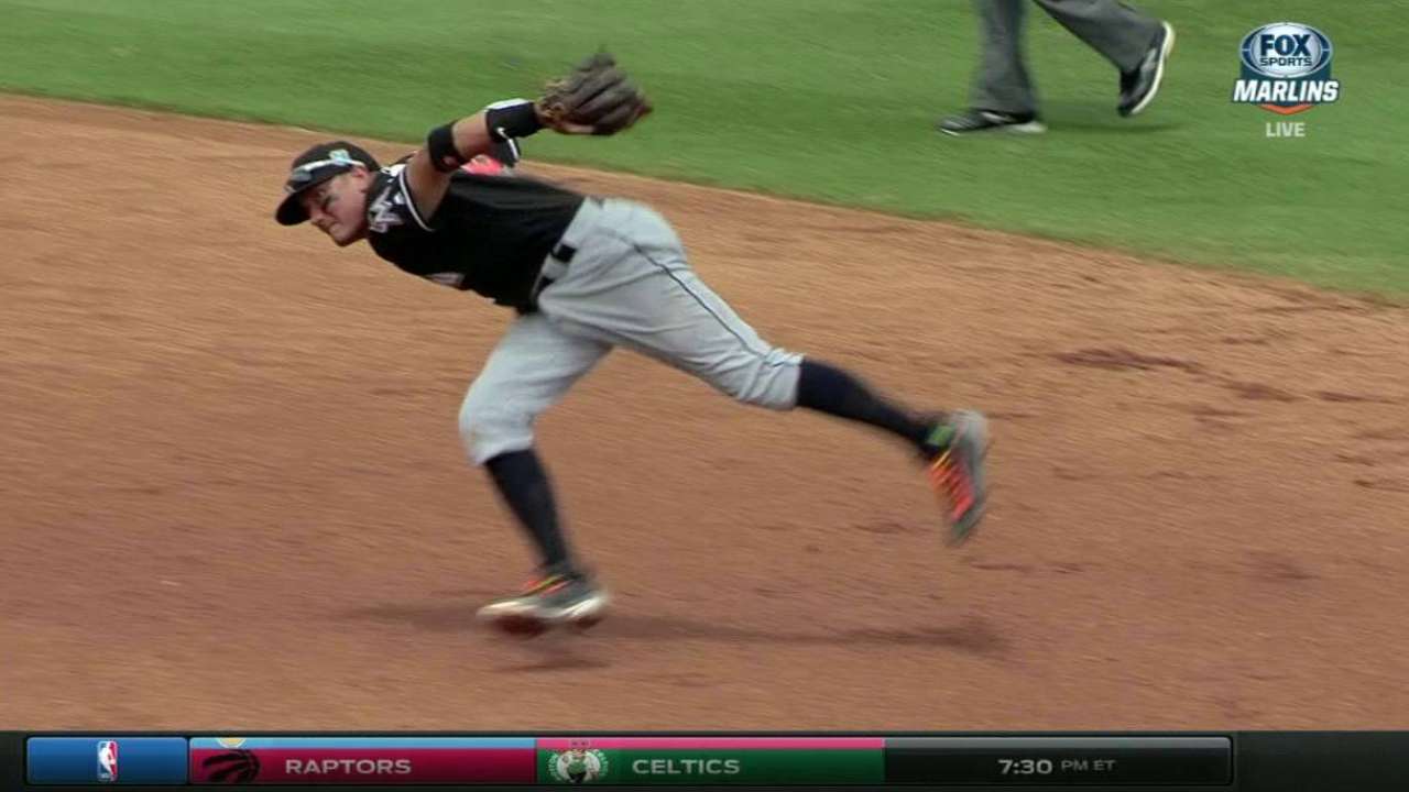 Rojas barehands ball for out