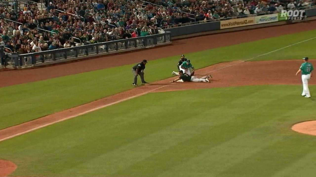 Coghlan, A's outlast Seattle in wild hit parade