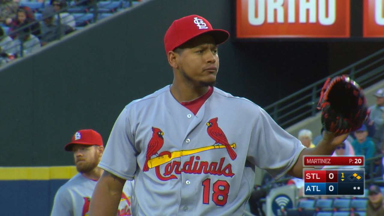Cards thump Braves behind Martinez, Wong