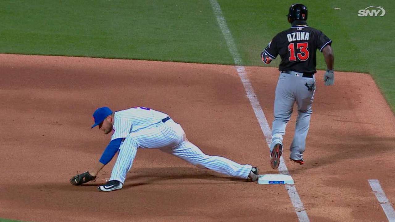 Ozuna called safe after review