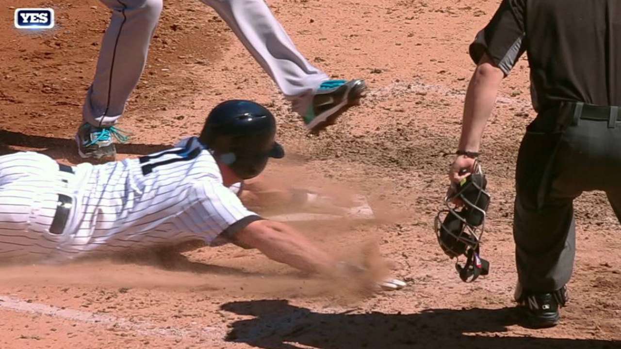 Gardner scores on a wild pitch