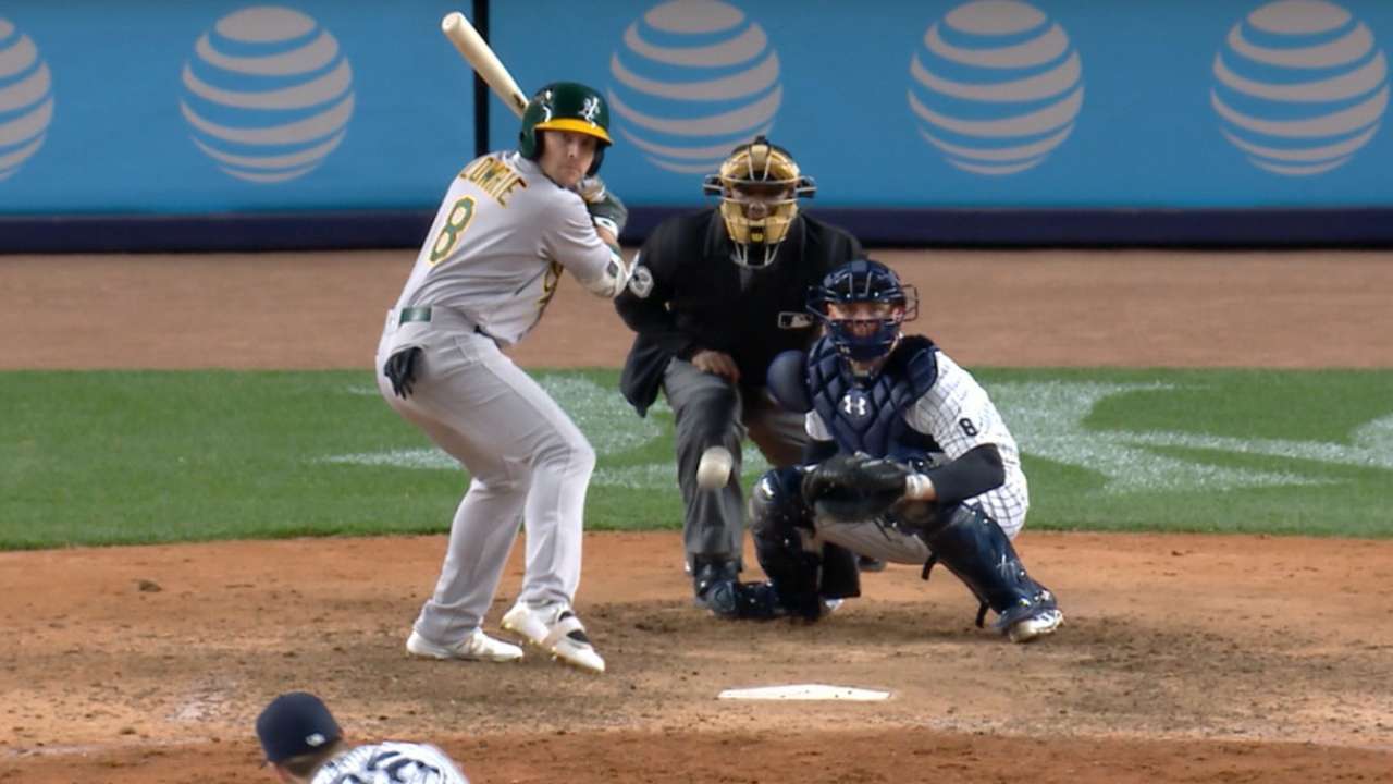 Lowrie collects four hits