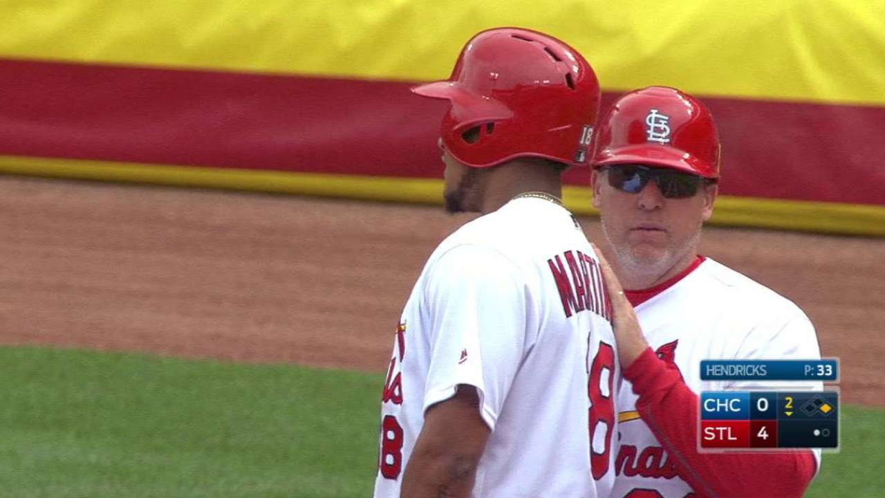 Worth the wait: Cards hold off Cubs after delay