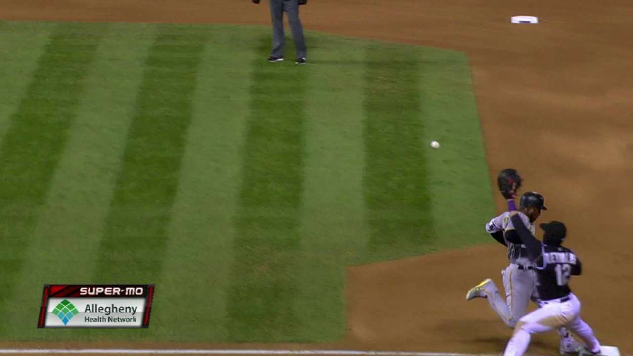 Marte beats the throw to first