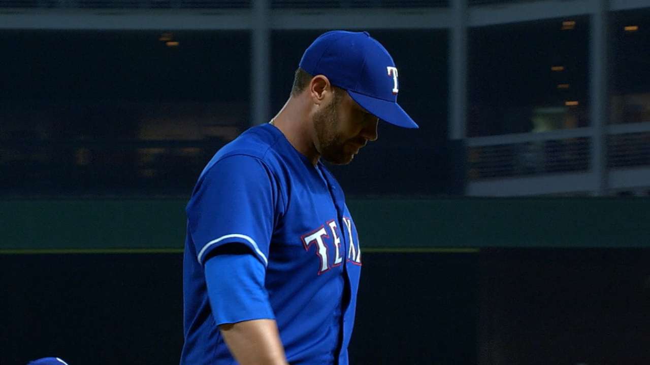 Lewis holds Angels to two runs