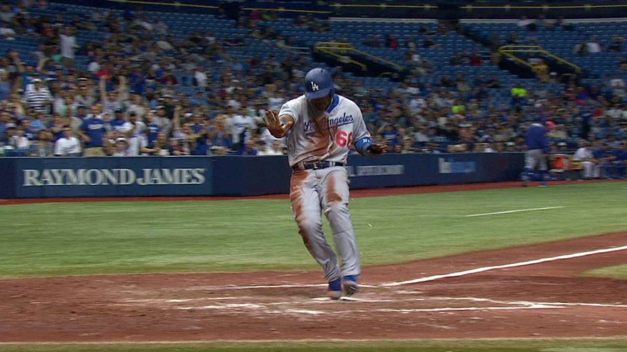 Puig scores on wild pitch