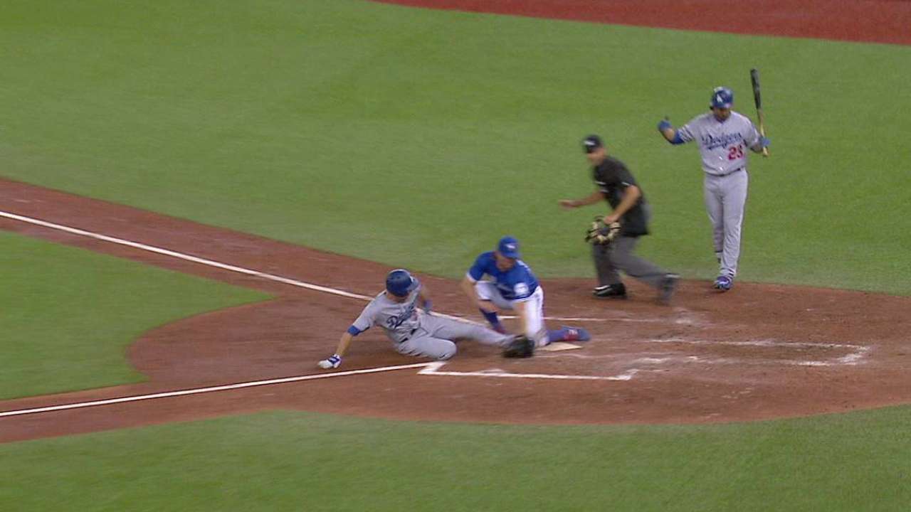 Utley scores on a passed ball