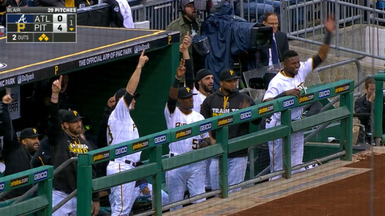 Pirates tally 12 runs to hold off Braves