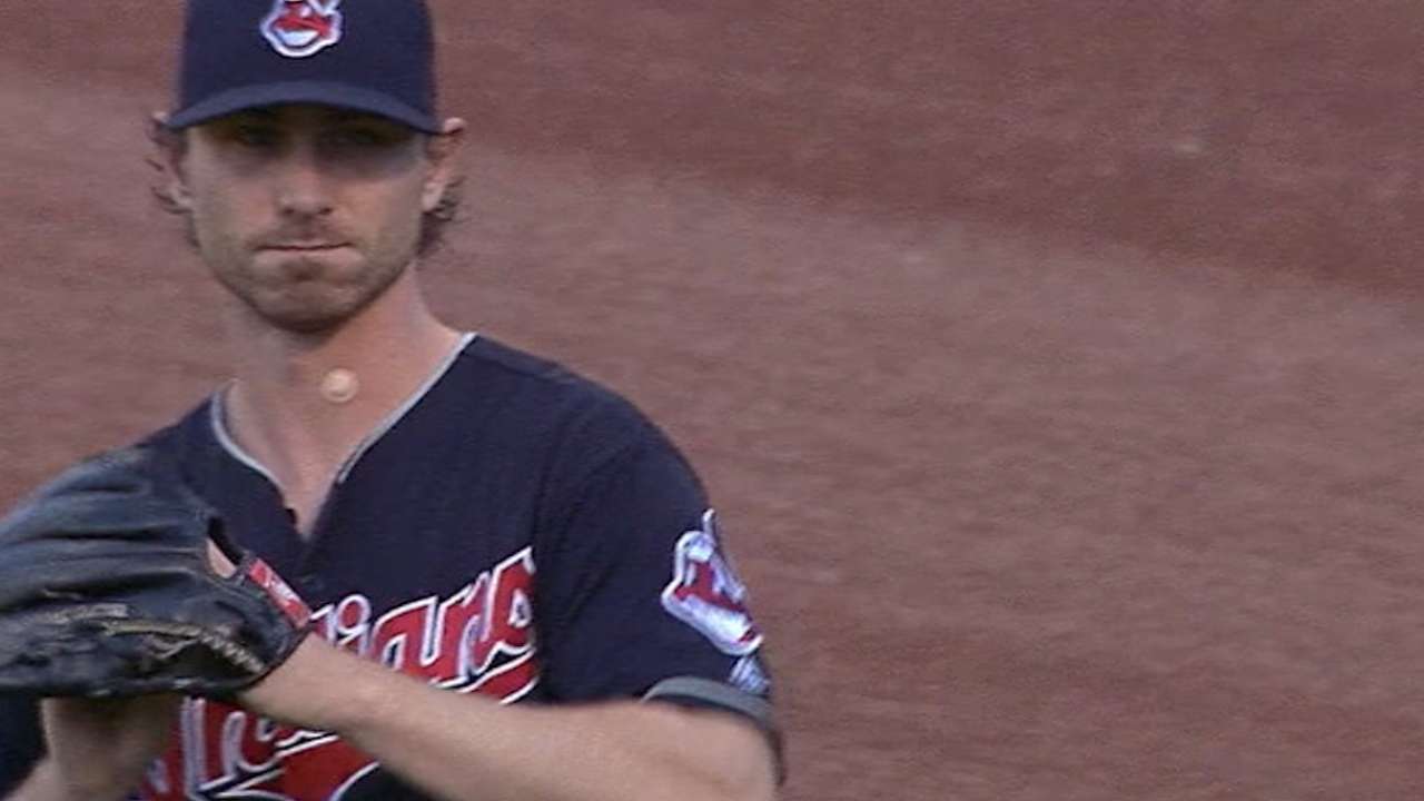 Tomlin strikes out seven in win