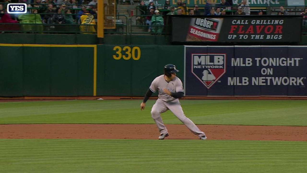 McCann reaches on an error