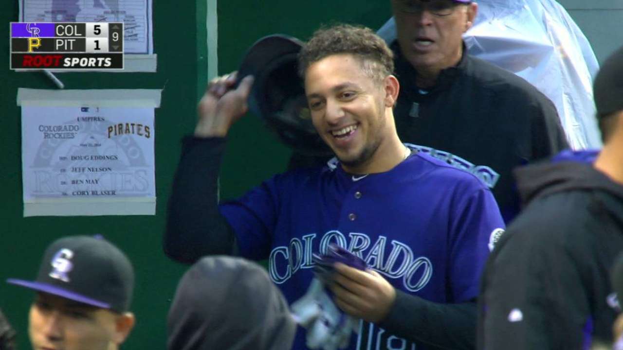 Rockies top Pirates with four-run ninth