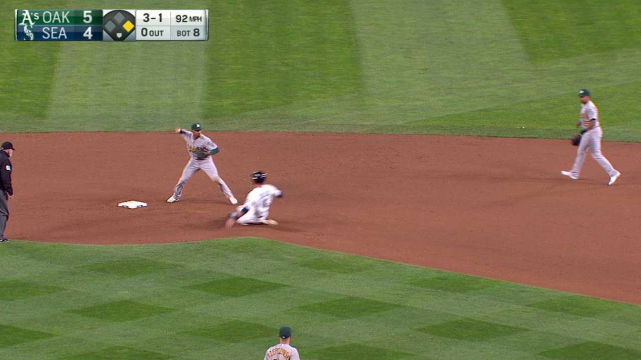 A's turn double play in the 8th