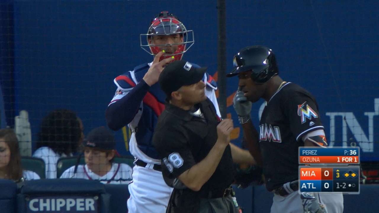 Ozuna's eye exam with umpire