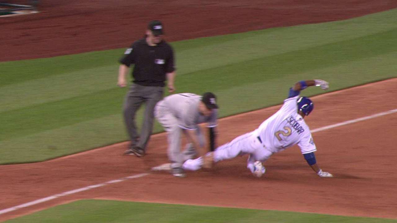 Escobar safe at third