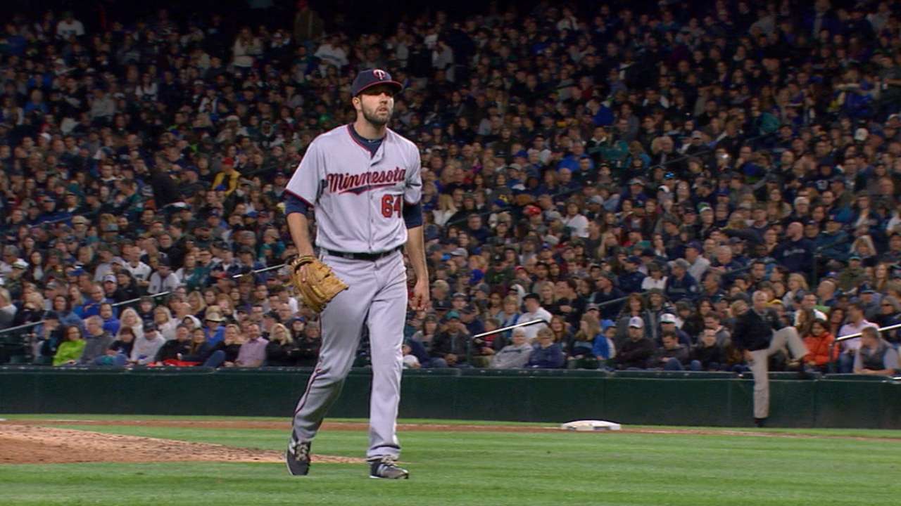 Dean tops Mariners, wins 1st big league game