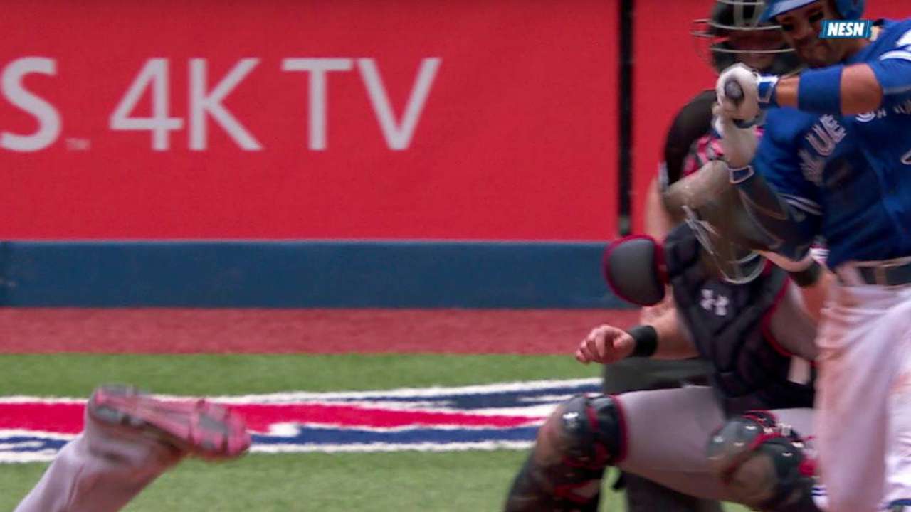 Travis hits a foul ball