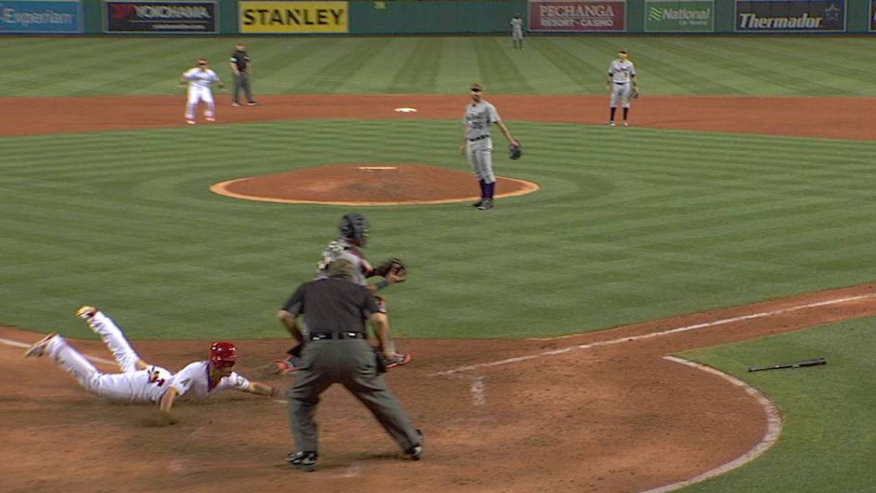 Angels score two on a grounder