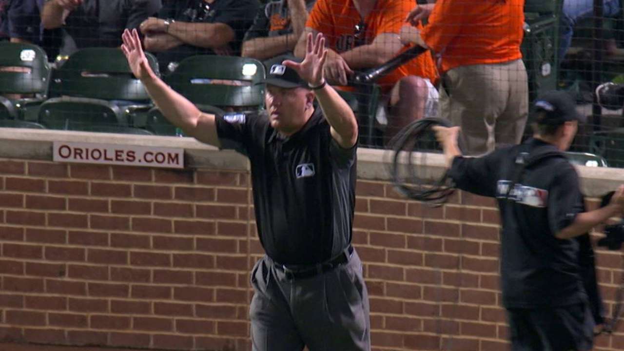 Umpires rule fly ball foul