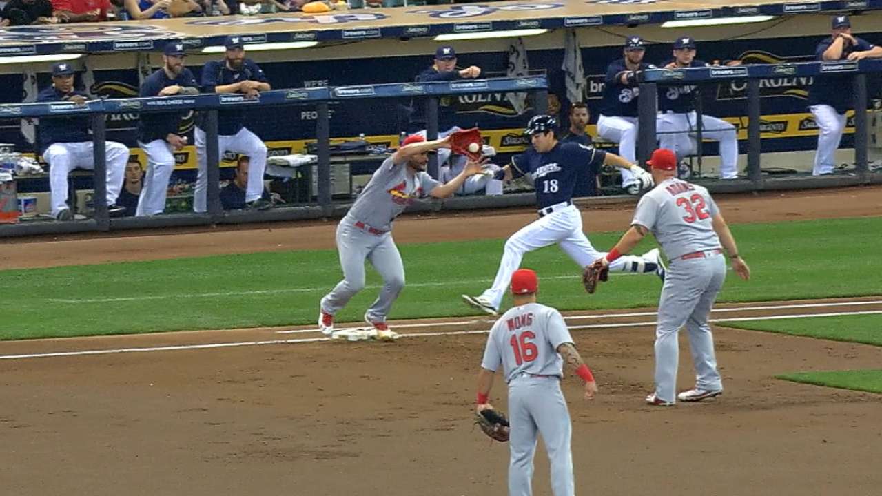 Adams throws out Flores at first