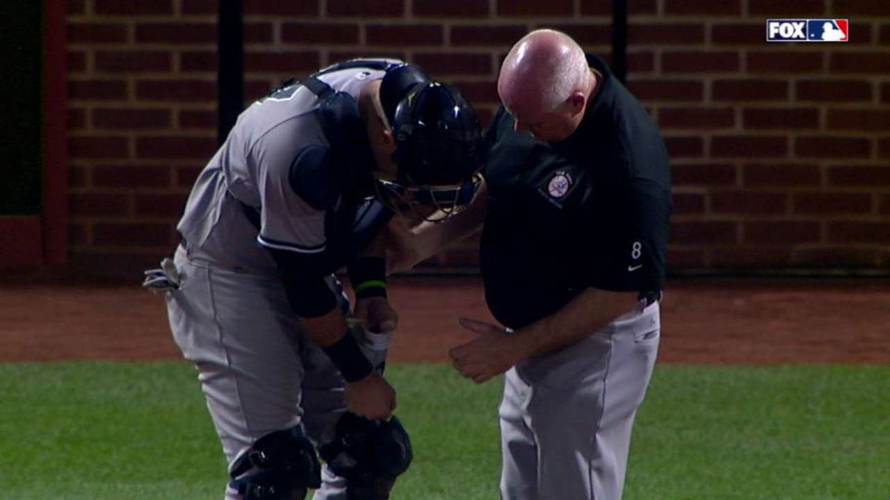 Romine injures thumb on Chapman warmup pitch
