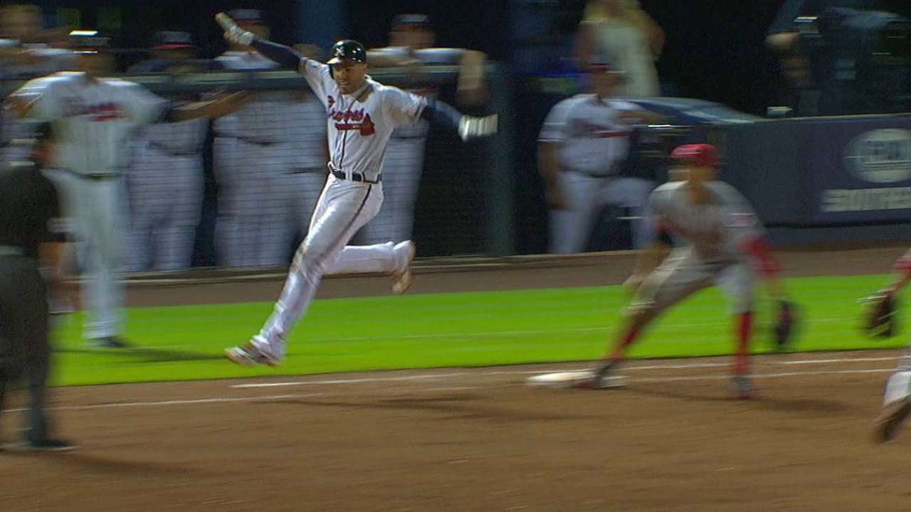 Reds challenge play at first