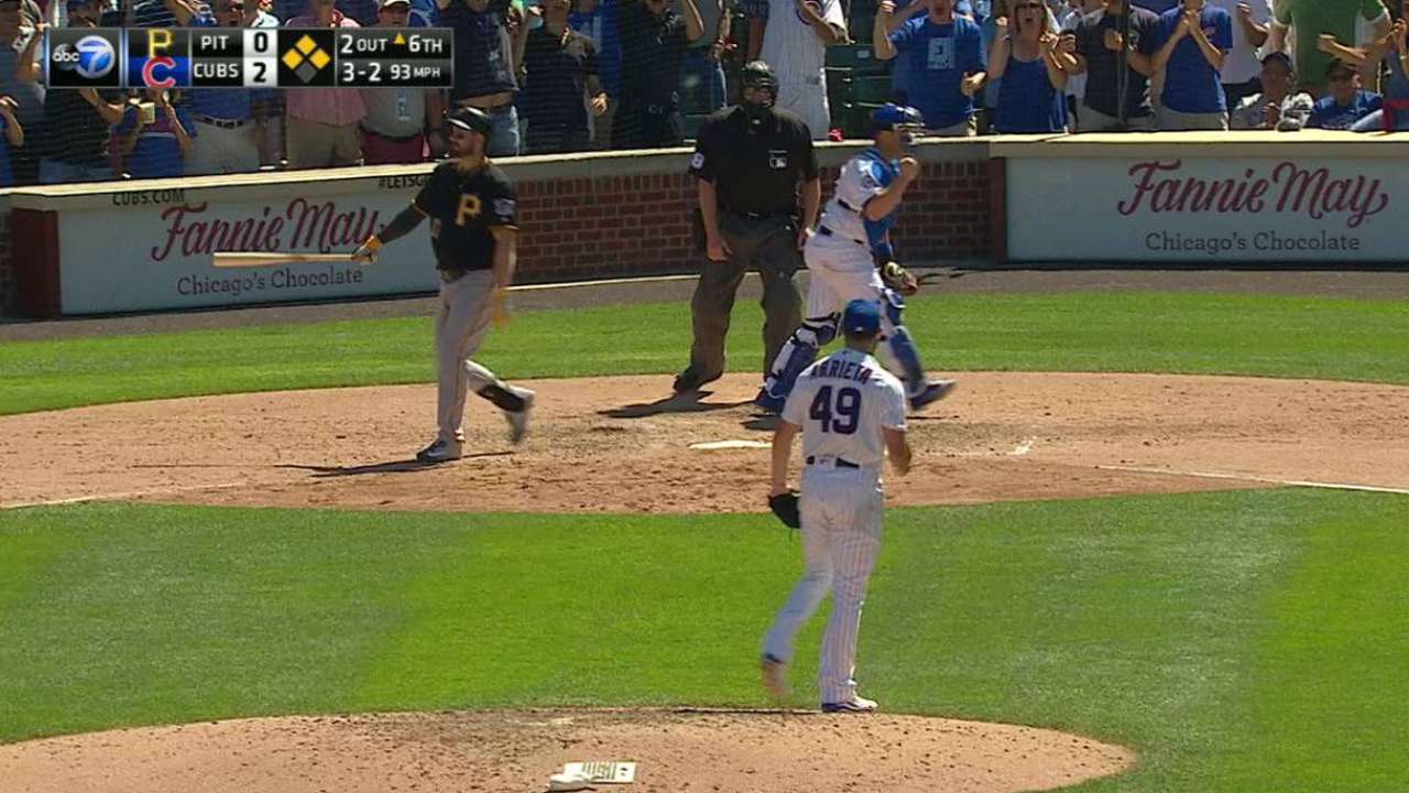 Arrieta escapes bases-loaded jam
