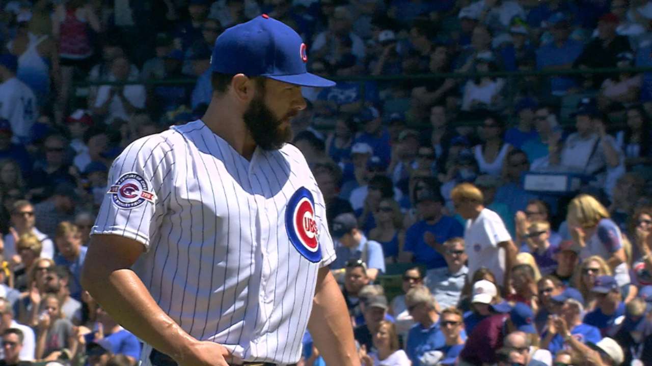 Faced with rare bit of adversity, Arrieta prevails