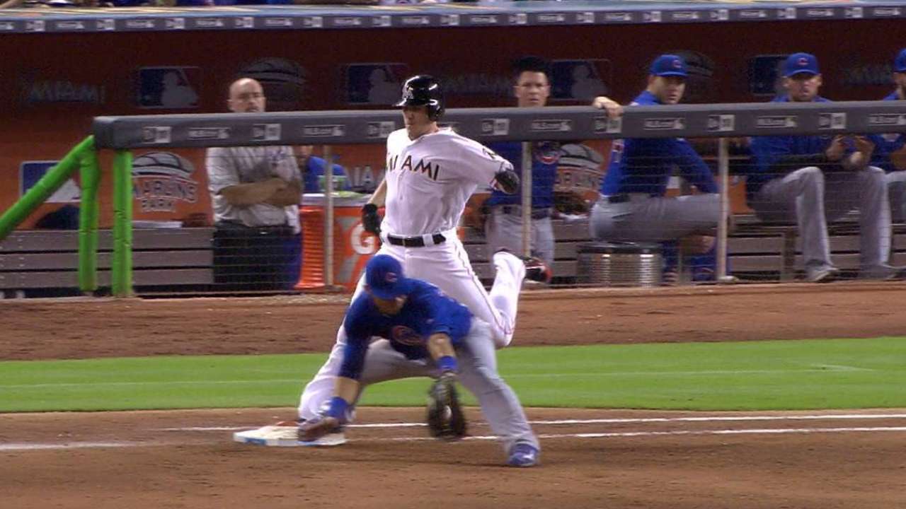 Realmuto ruled safe at first