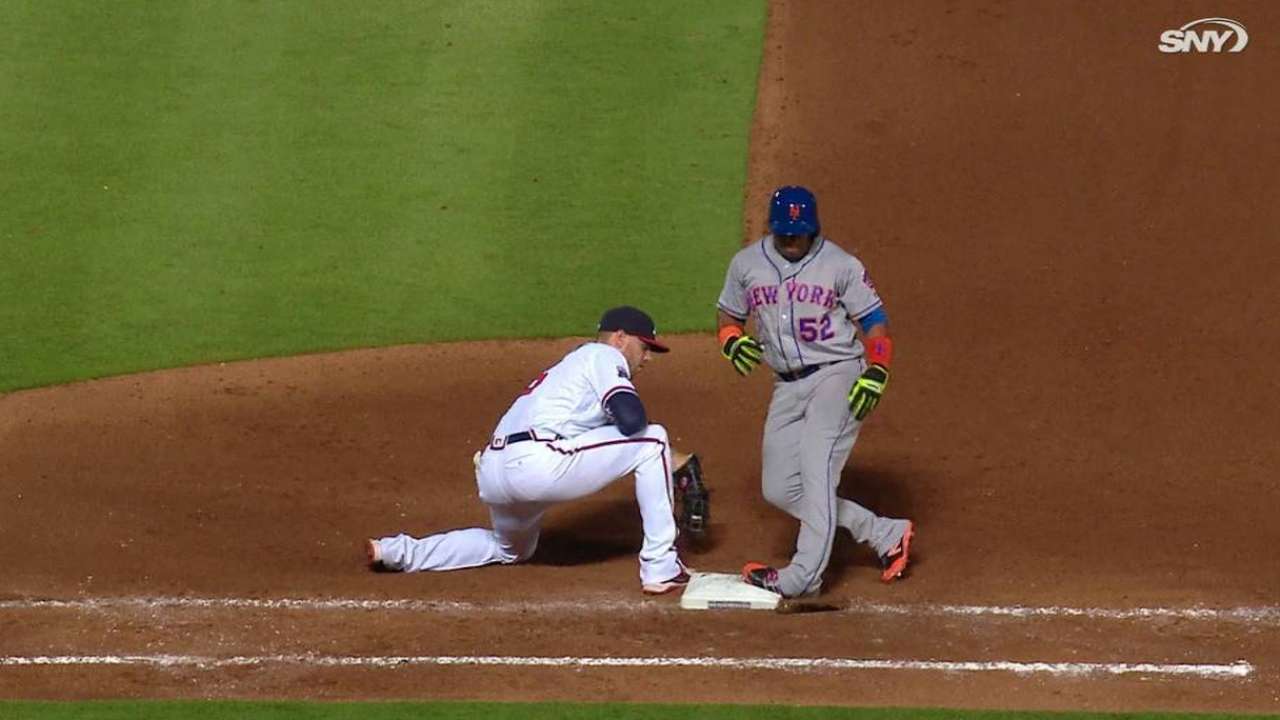 Cespedes OK after twisting ankle on first base