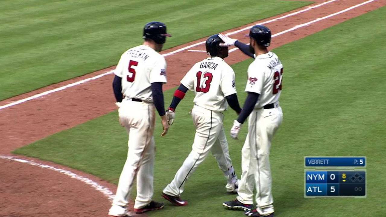 Braves ride HRs, strong Norris to split with Mets