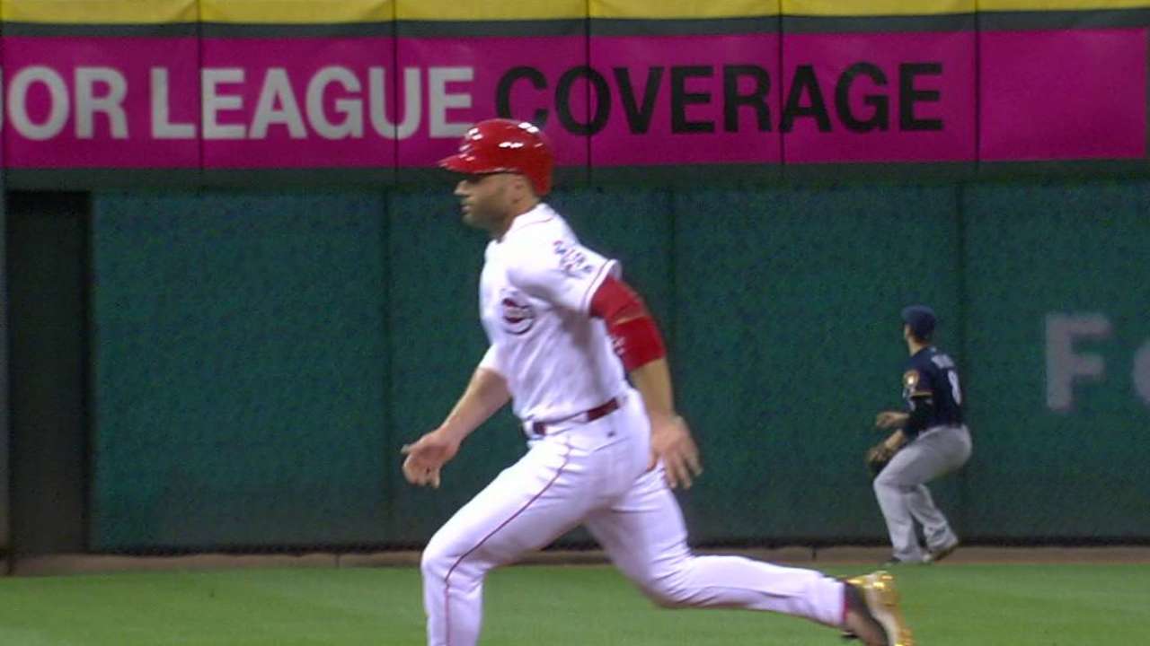 Duvall, Barnhart power Reds' rally in opener