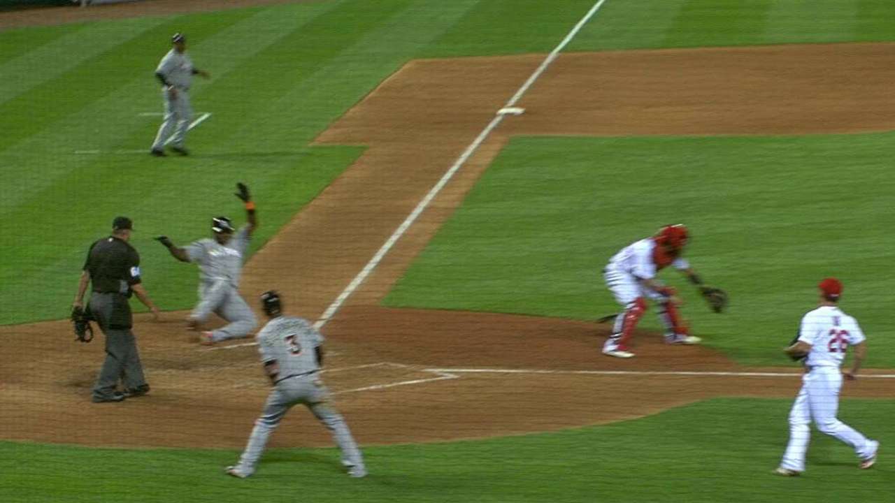 Relentless Marlins edge Cardinals in opener