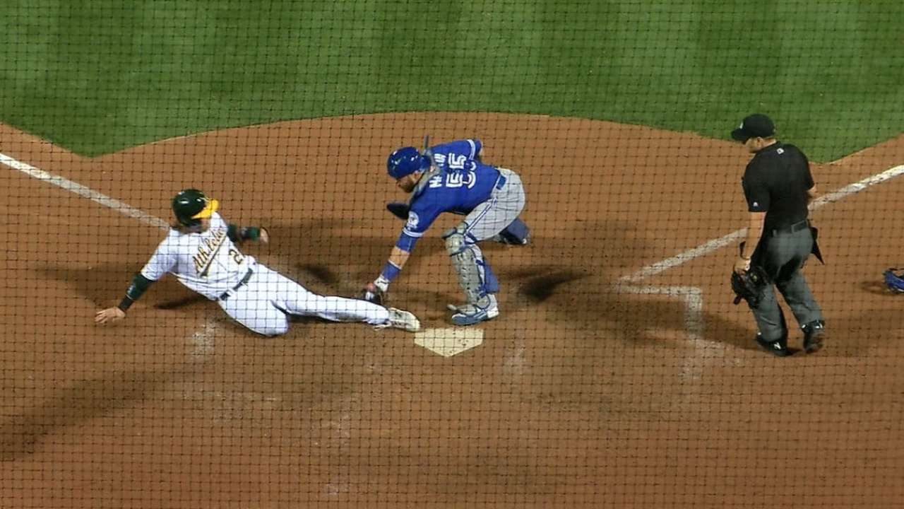 A's challenge at plate decisive vs. Blue Jays