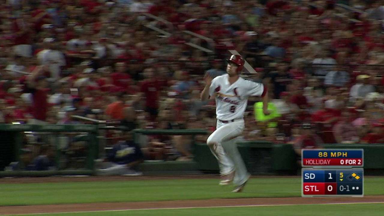 Holliday helps give Cards a lead