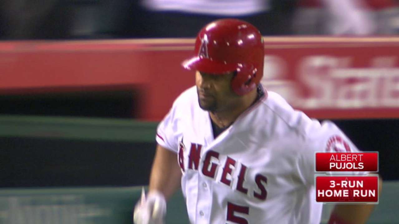 Pujols' second three-run homer