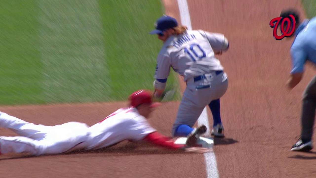 Turner steals third on review