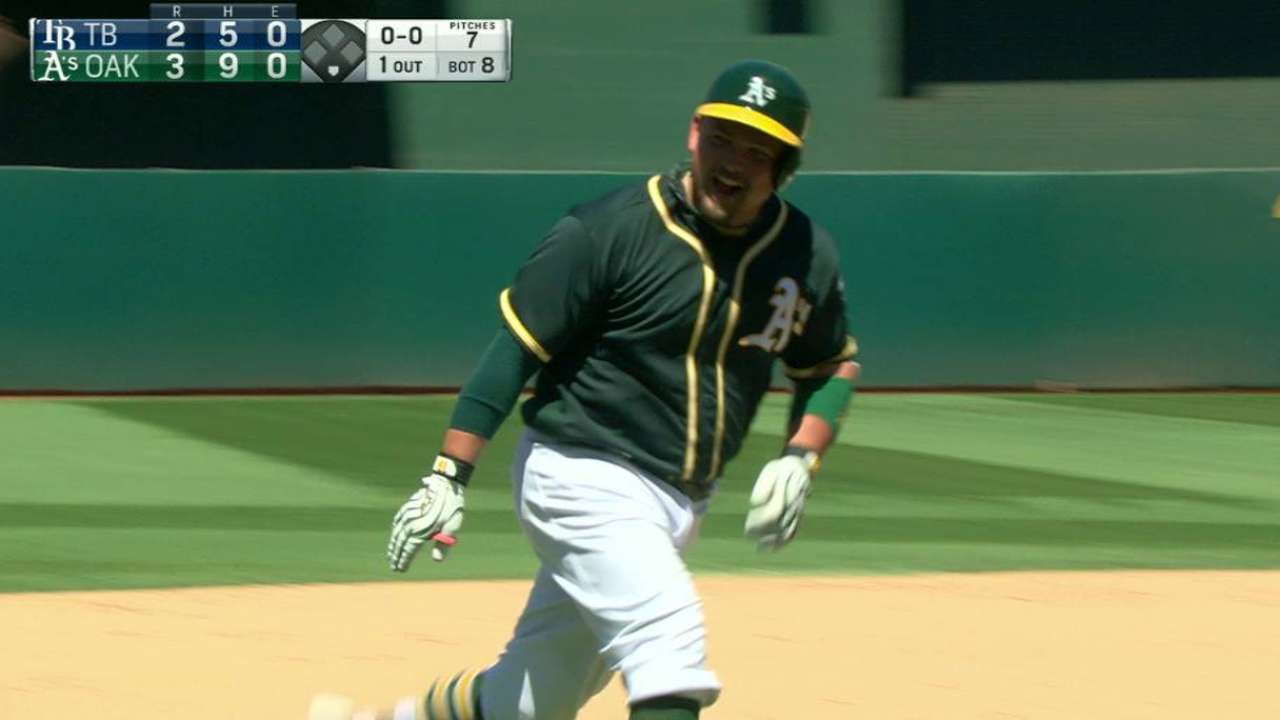 Butler's blast lifts A's past Rays for series win