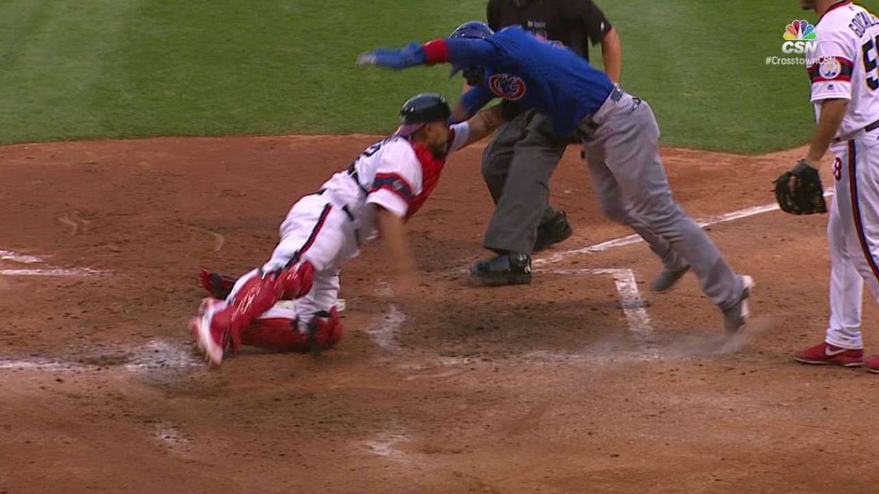 Saladino nabs Baez at the plate